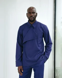 A Navy blue, layered front-covered shirt.