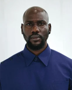 A Navy blue, layered front-covered shirt.