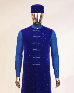 A Navy blue long sleeve kaftan, Admiral blue velvet jacket & mandarin buttons, hat and sokoto African traditional senator kaftan native.