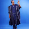 A Navy blue, Malian with layered dropped square pattern jacquard embroidery details, traditional Agbada