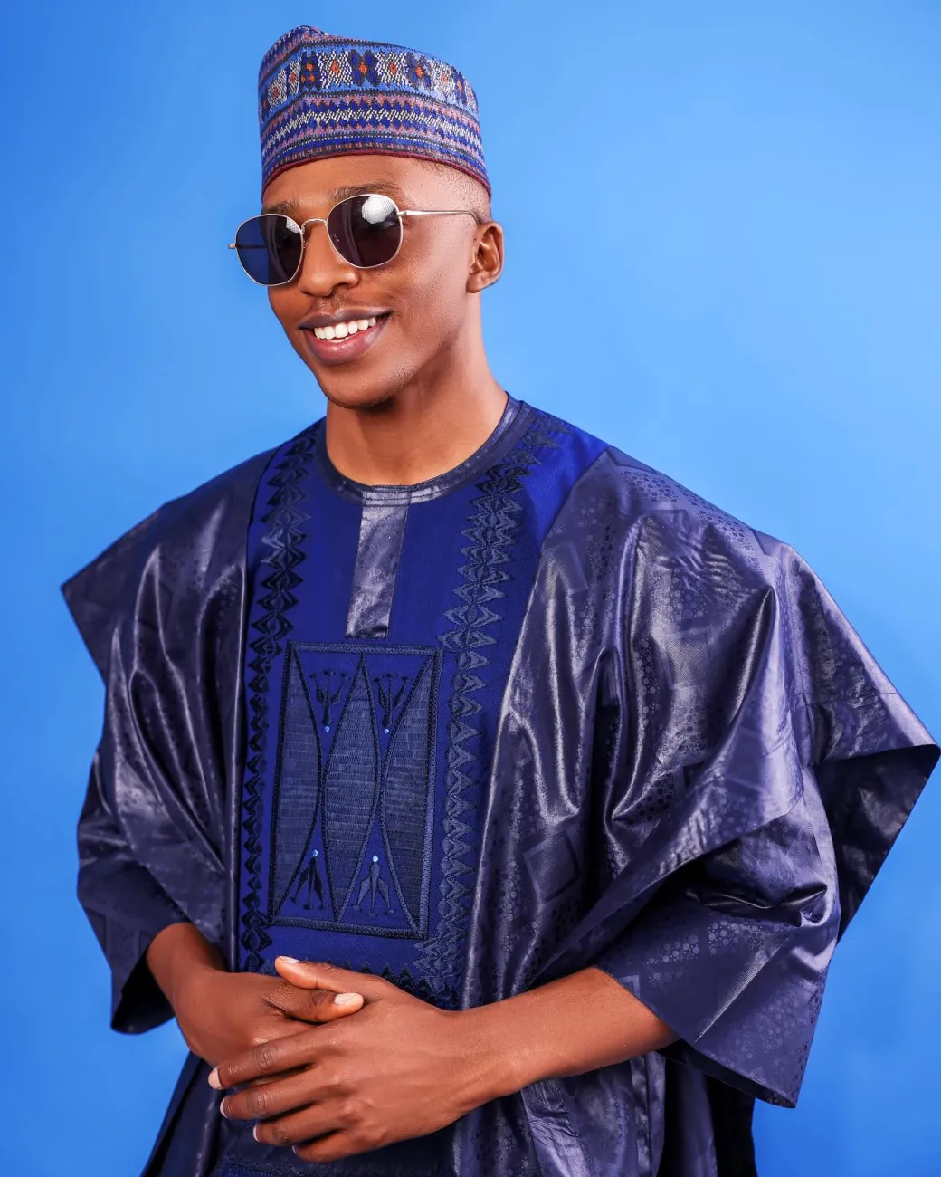 A Navy blue, Malian with layered dropped square pattern jacquard embroidery details, traditional Agbada