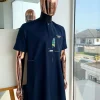 A Navy blue, multileg intersection pocket with clear view flap Swarovski button detailing african traditional senator kaftan native.