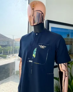 A Navy blue, multileg intersection pocket with clear view flap Swarovski button detailing african traditional senator kaftan native.