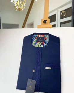 A Navy blue off-pattern embroidery with a matching patch pocket African Kaftan and Sokoto