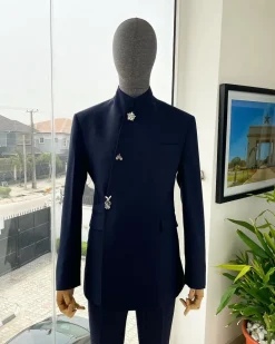 A Navy blue “parabellum”, wrap notch lapel blazer suit