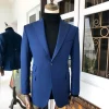 A Navy Blue Peak Lapel Business Suit