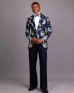 A Navy Blue Peak Lapel, Dispersed Crown Metallic Jacquard Tuxedo Suit And Wide Cut Pant Trouser.
