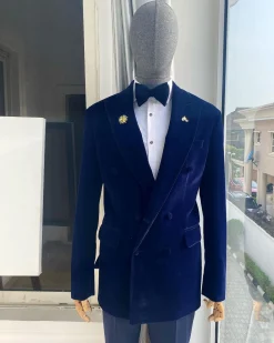 A Navy Blue Peak Lapel Double Breasted Soaked Italian Velvet Tuxedo Suit