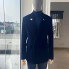 A Navy Blue peak lapel double breasted soaked Italian velvet tuxedo suit