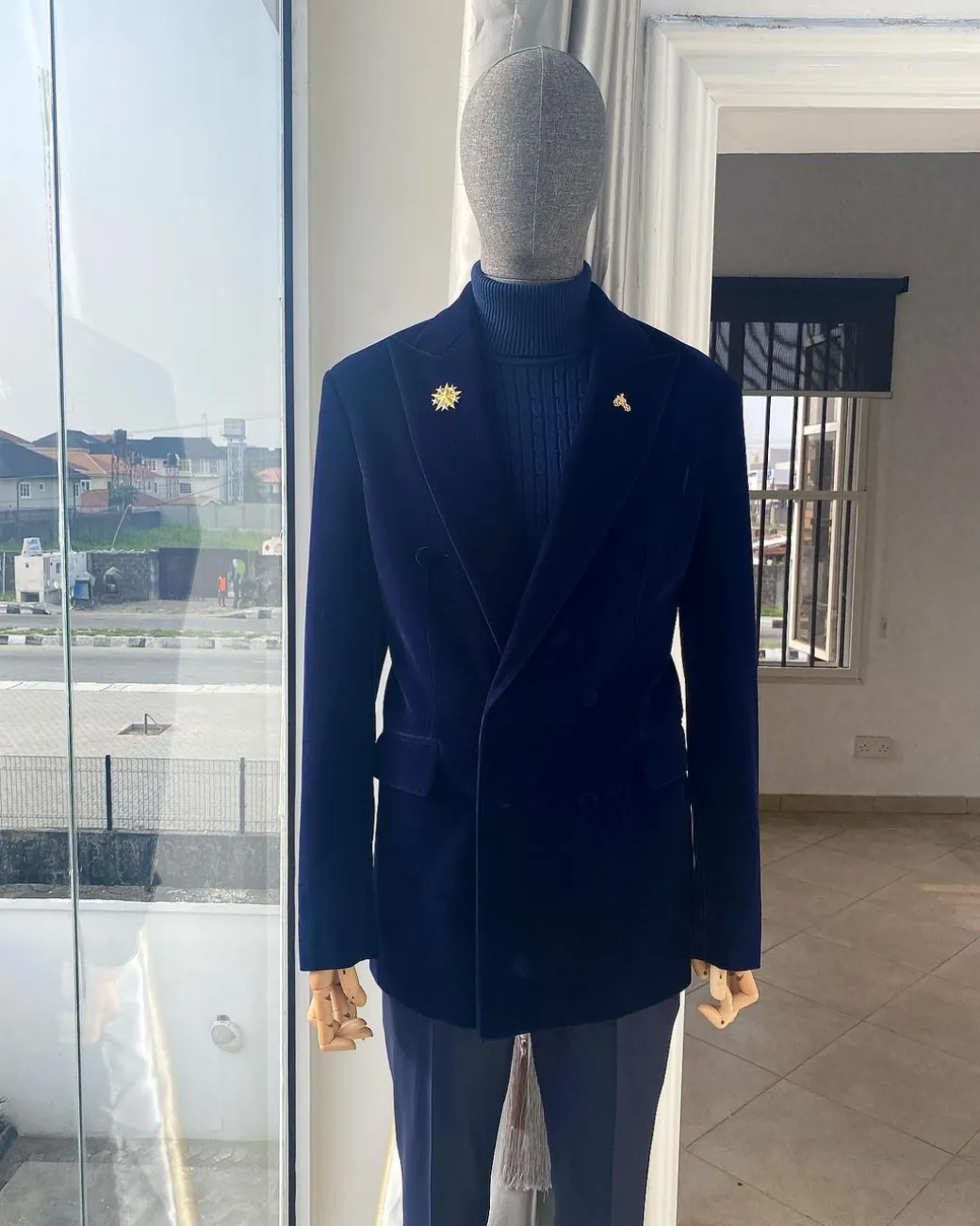 A Navy Blue peak lapel double breasted soaked Italian velvet tuxedo suit