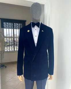 A Navy Blue Peak Lapel Double Breasted Soaked Italian Velvet Tuxedo Suit