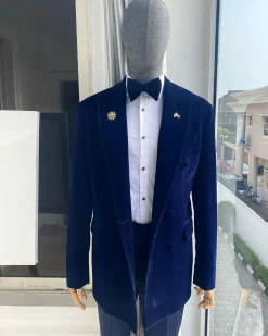 A Navy Blue Peak Lapel Double Breasted Soaked Italian Velvet Tuxedo Suit