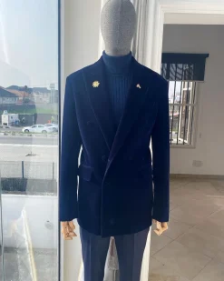 A Navy Blue peak lapel double breasted soaked Italian velvet tuxedo suit