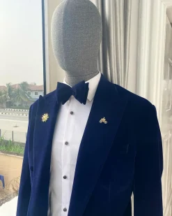 A Navy Blue Peak Lapel Double Breasted Soaked Italian Velvet Tuxedo Suit