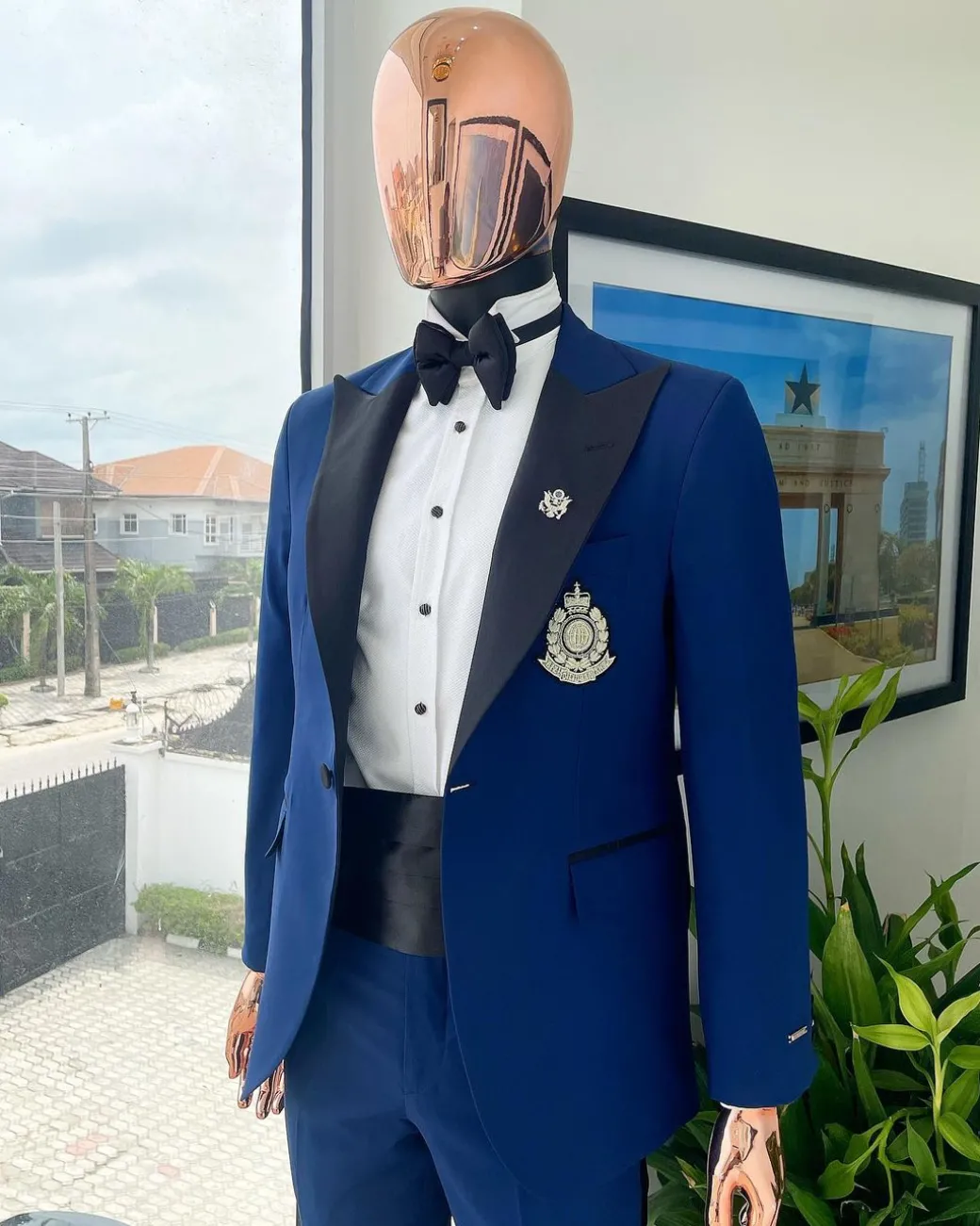 A Navy blue peak lapel tuxedo suit