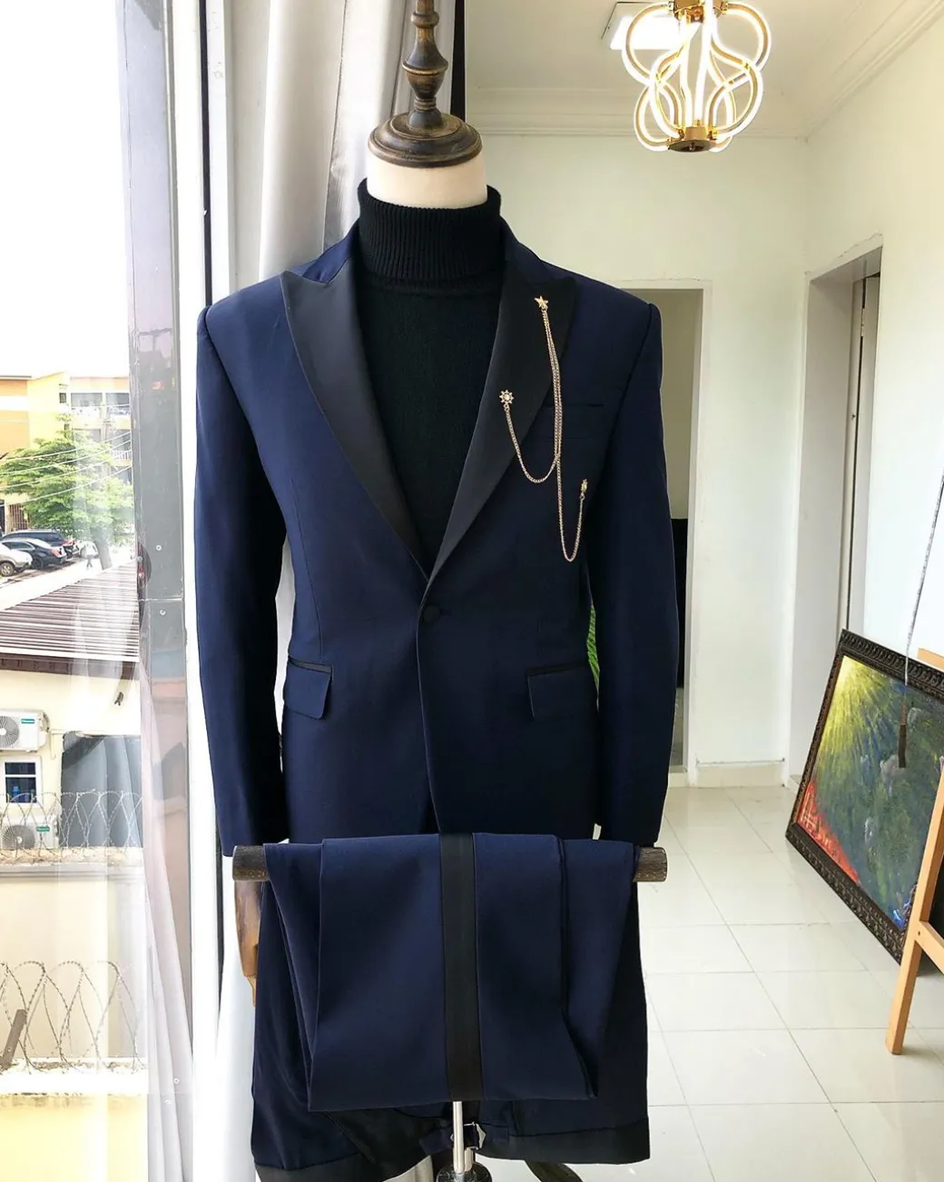 A Navy Blue Peak lapel Tuxedo suit