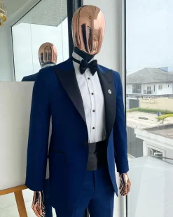 A Navy blue peak lapel tuxedo suit