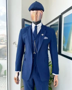 A navy blue “peaky blinders” – Jorgecarli super 140’s- “Board Room” notch lapel suit