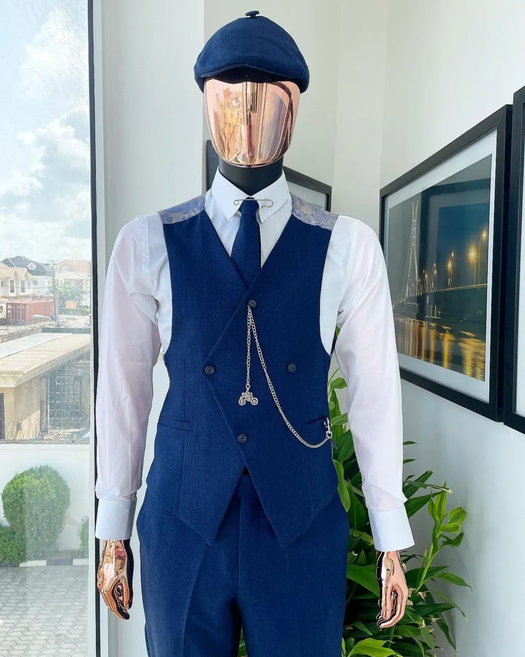 A navy blue “peaky blinders” – Jorgecarli super 140’s- “Board Room” notch lapel suit