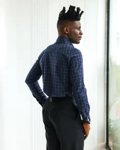 A Navy blue plaid check, high collar business shirt.