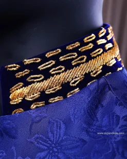 A Navy blue “Prince of Persia” ceremonial tail suit, Gold Metal Wire hand woven embroidery detail mix on velvet