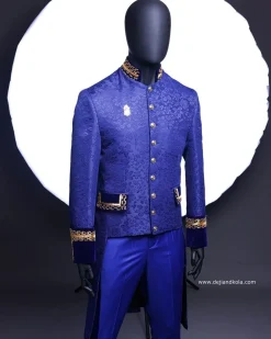 A Navy blue “Prince of Persia” ceremonial tail suit, Gold Metal Wire hand woven embroidery detail mix on velvet