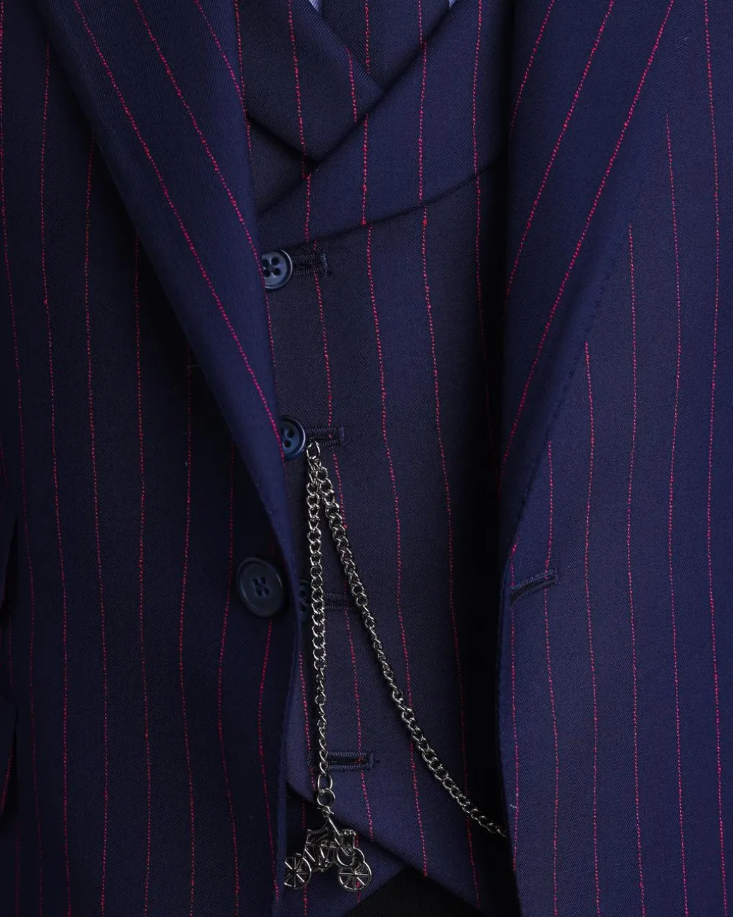 A Navy blue, red pencil stripe, jorgecarli, peak lapel suit.