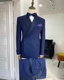 A Navy blue Reloaded “Arthur Richard” wrap peak and shawl lapel Tuxedo Suit