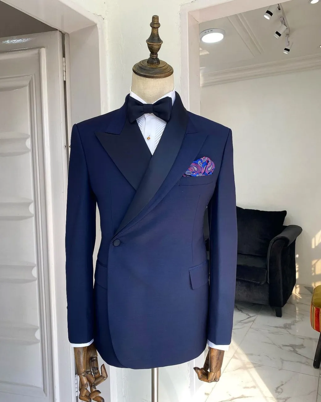 A Navy blue Reloaded “Arthur Richard” wrap peak and shawl lapel Tuxedo Suit