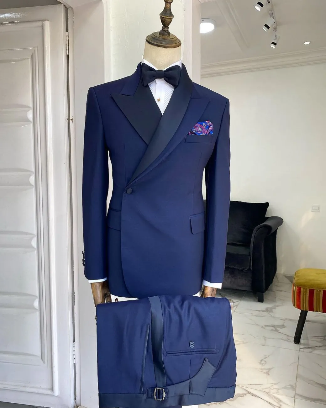 A Navy blue Reloaded “Arthur Richard” wrap peak and shawl lapel Tuxedo Suit