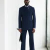 A Navy Blue, Seersucker, “Herd” Warp Peak Lapel Suit.