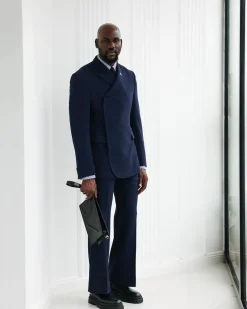 A Navy Blue, Seersucker, “Herd” Warp Peak Lapel Suit.