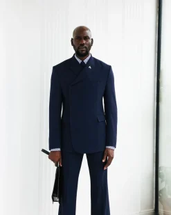 A Navy Blue, Seersucker, “Herd” Warp Peak Lapel Suit.