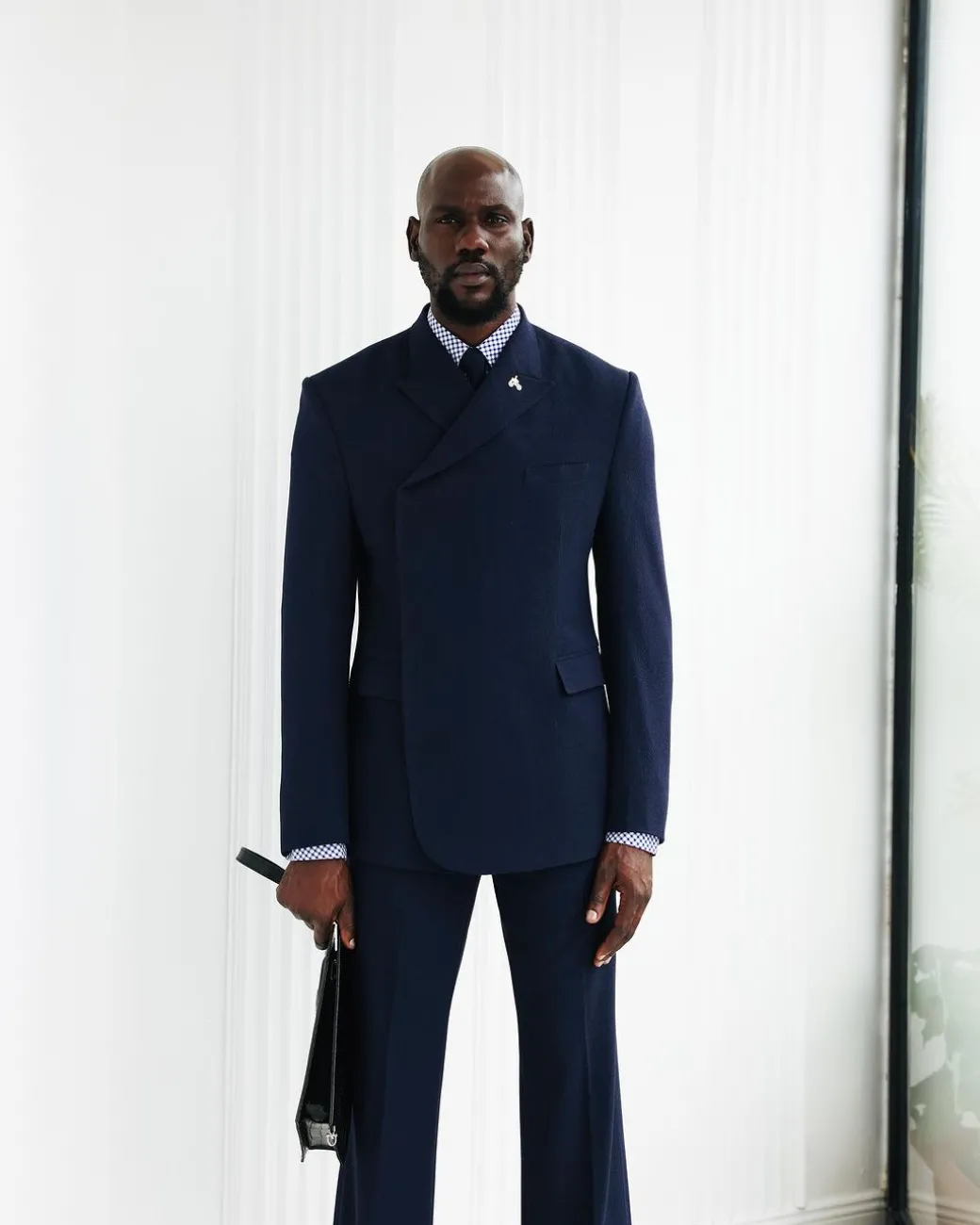 A Navy Blue, Seersucker, “Herd” Warp Peak Lapel Suit.