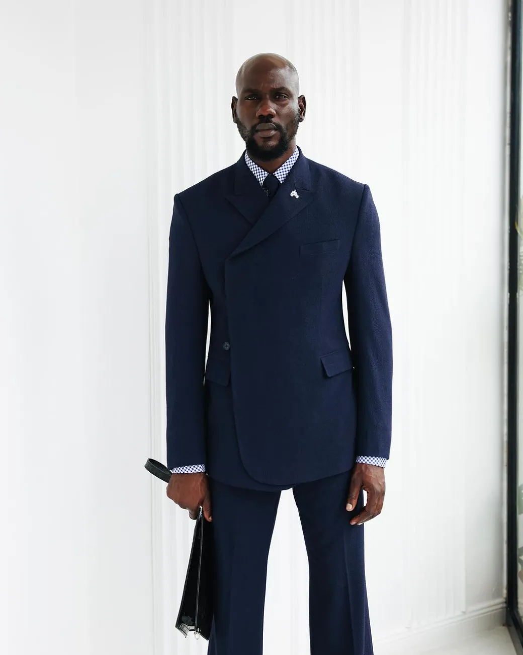 A Navy Blue, Seersucker, “Herd” Warp Peak Lapel Suit.