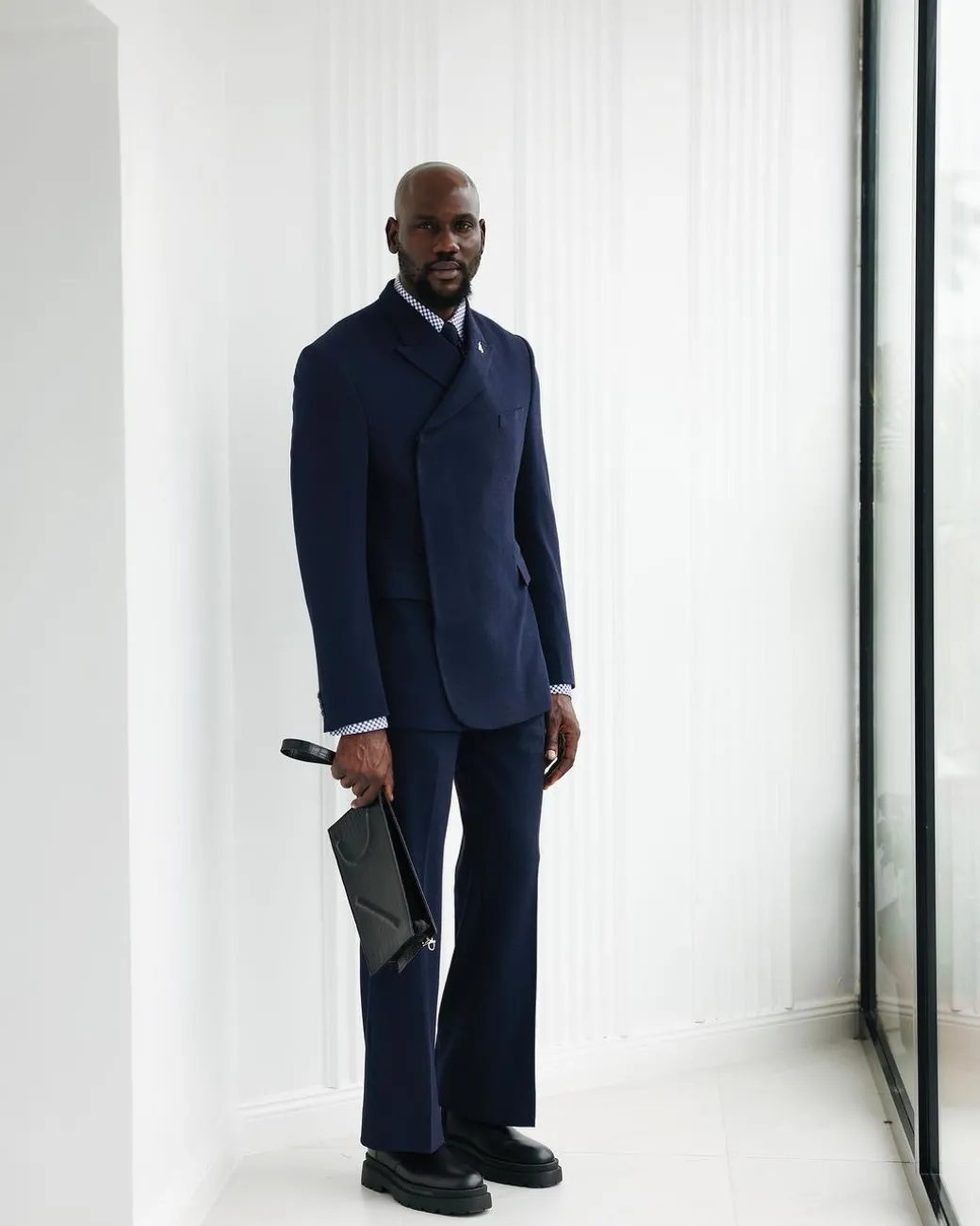 A Navy Blue, Seersucker, “Herd” Warp Peak Lapel Suit.