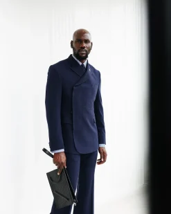 A Navy Blue, Seersucker, “Herd” Warp Peak Lapel Suit.