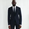 A Navy Blue, Seersucker, Reversed Pin Stripe Peak Lapel Suit
