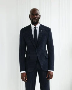 A Navy Blue, Seersucker, Reversed Pin Stripe Peak Lapel Suit
