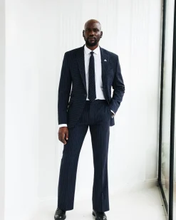 A Navy Blue, Seersucker, Reversed Pin Stripe Peak Lapel Suit
