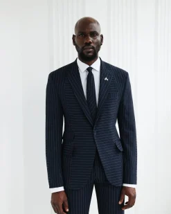 A Navy Blue, Seersucker, Reversed Pin Stripe Peak Lapel Suit