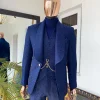 A Navy blue shawl lapel floral pattern jacquard tuxedo suit
