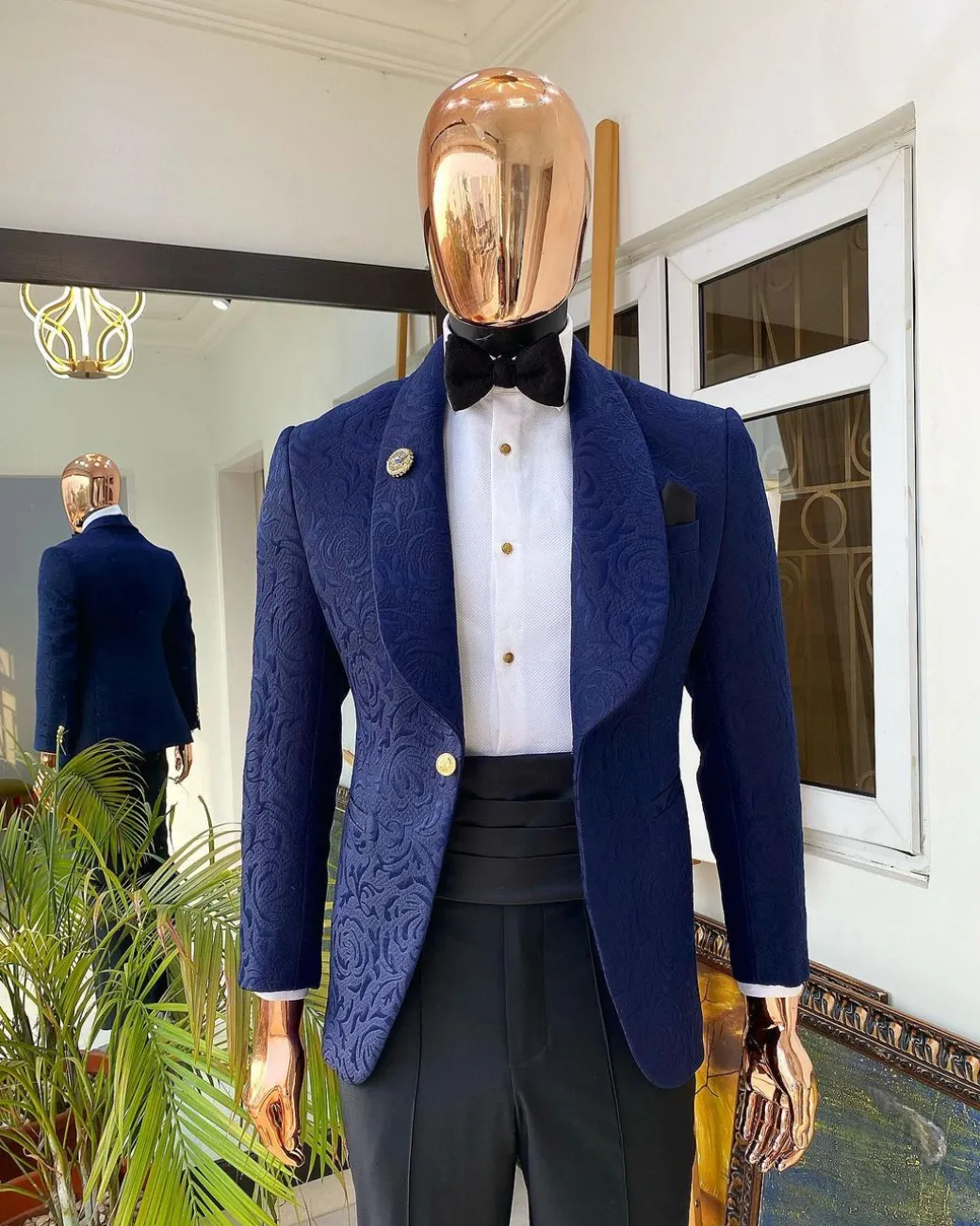 A Navy Blue shawl lapel floral pattern jacquard tuxedo suit