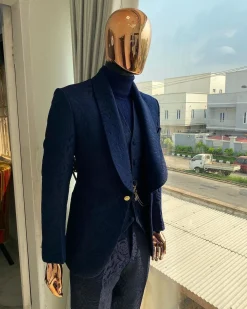 A Navy blue shawl lapel floral pattern jacquard tuxedo suit