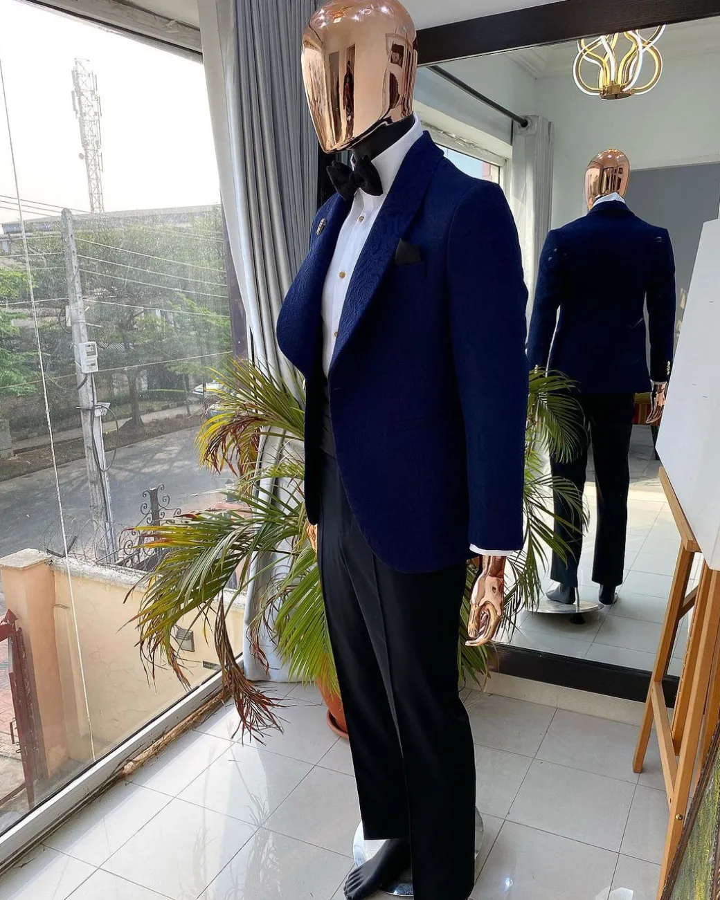 A Navy Blue shawl lapel floral pattern jacquard tuxedo suit