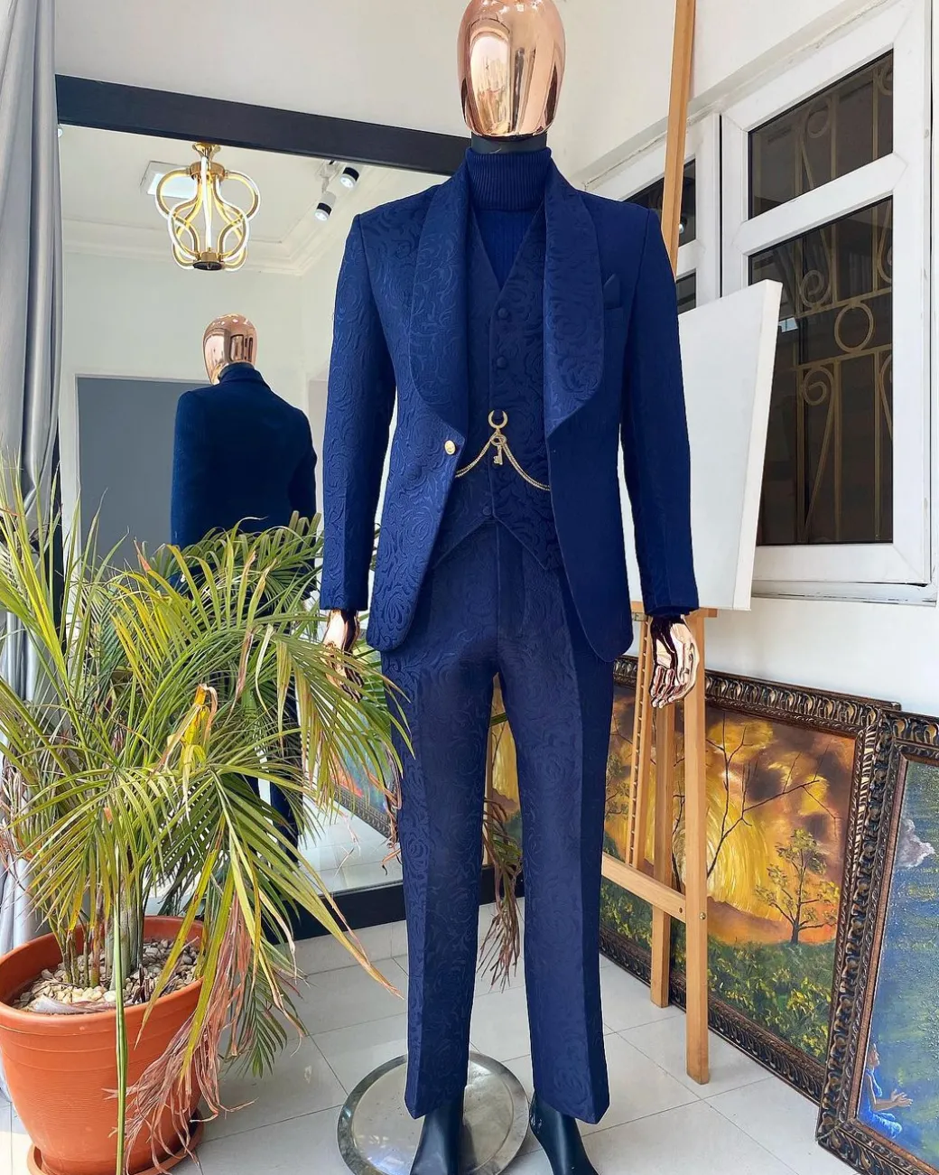 A Navy blue shawl lapel floral pattern jacquard tuxedo suit