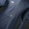 A Navy blue, silver, and black piped neck spiral embroidery detailing African traditional senator kaftan native.