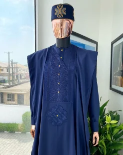 A Navy Blue, Slanting Cube With Dotted Gold Detailing Agbada