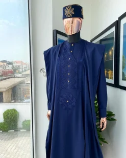 A Navy Blue, Slanting Cube With Dotted Gold Detailing Agbada