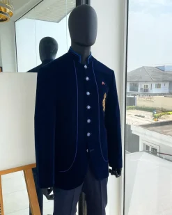 A Navy blue Soaked Italian velvet, long sleeve with woven tread taping safari suit